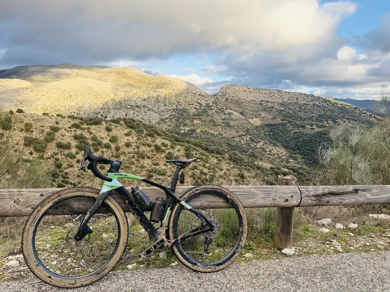 Gravel bike overlooking the mountains near Ronda